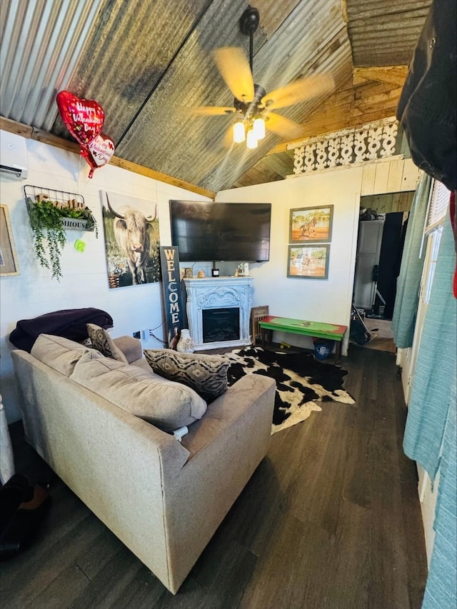 living room with lofted ceiling, ceiling fan, a wall mounted air conditioner, and dark wood finished floors