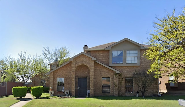 view of front property featuring a front yard