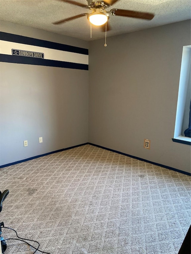 710 Cresent Dr, Desoto, TX 75115 - carpeted spare room featuring a ceiling fan and a textured ceiling