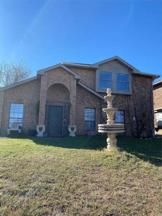 710 Cresent Dr, Desoto, TX 75115 - traditional-style house featuring brick siding and a front lawn