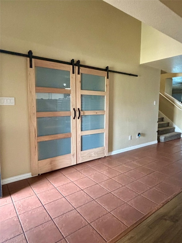 empty room with tile patterned floors