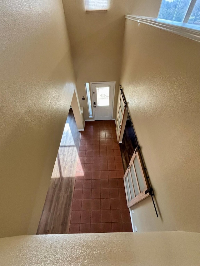 staircase with tile patterned flooring