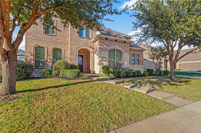 view of front of home with a front yard