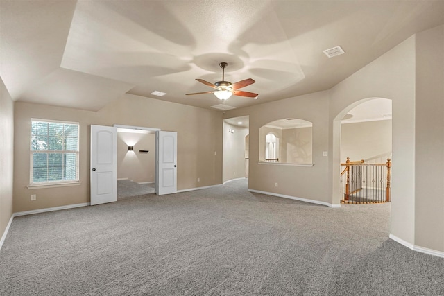 empty room with carpet and ceiling fan