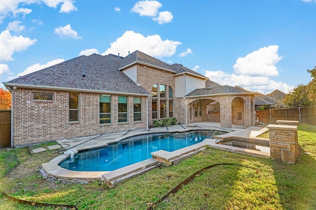 view of swimming pool with a yard and a patio