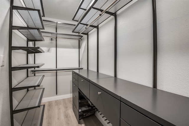 walk in closet featuring light wood-type flooring