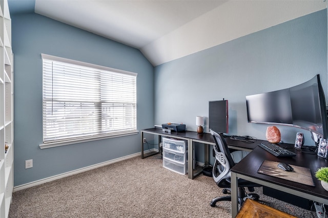 office space featuring lofted ceiling and carpet flooring