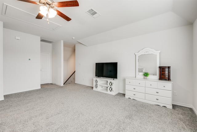 unfurnished living room with carpet flooring and ceiling fan