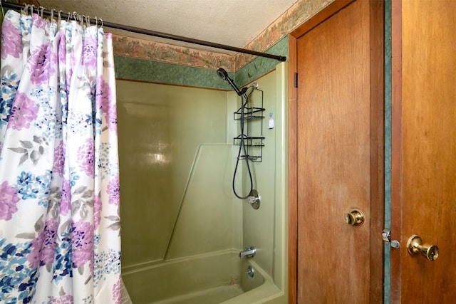 3533 Fir St, Weatherford, TX 76088 - bathroom with a textured ceiling and shower / bath combo