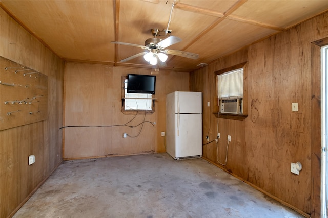 unfurnished room featuring ceiling fan, cooling unit, wood ceiling, and wooden walls