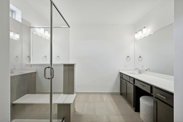 bathroom with vanity, tile patterned floors, and an enclosed shower