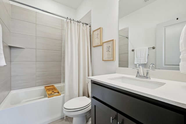 full bathroom featuring vanity, shower / bath combo, and toilet