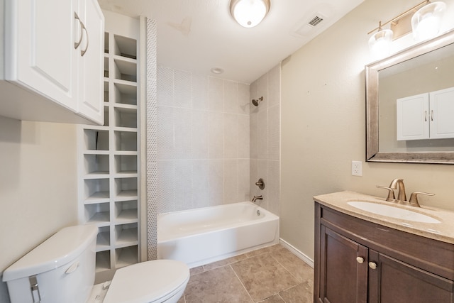 full bathroom featuring tile patterned floors, vanity, toilet, and tiled shower / bath