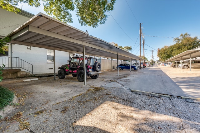 view of parking with a carport