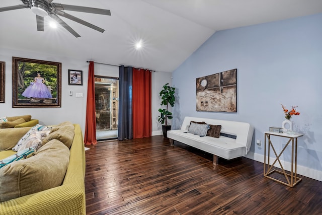 living room featuring ceiling fan, dark hardwood / wood-style floors, and vaulted ceiling