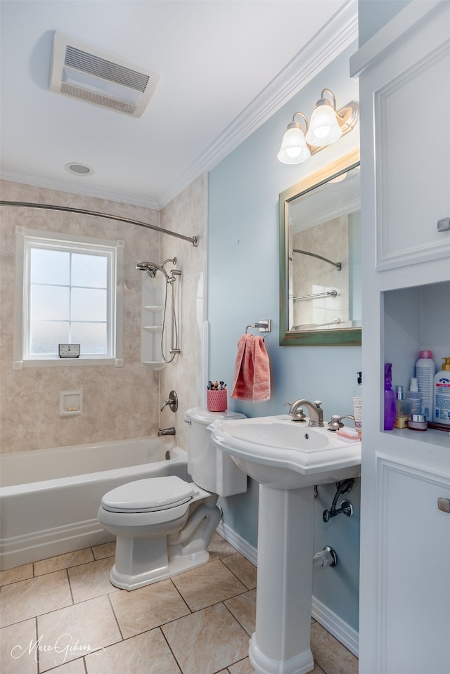 bathroom featuring toilet, tile patterned floors, tiled shower / bath, and ornamental molding