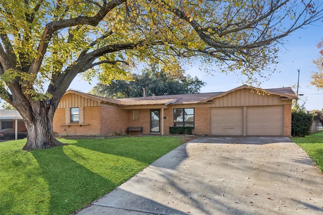 ranch-style house featuring a garage and a front yard