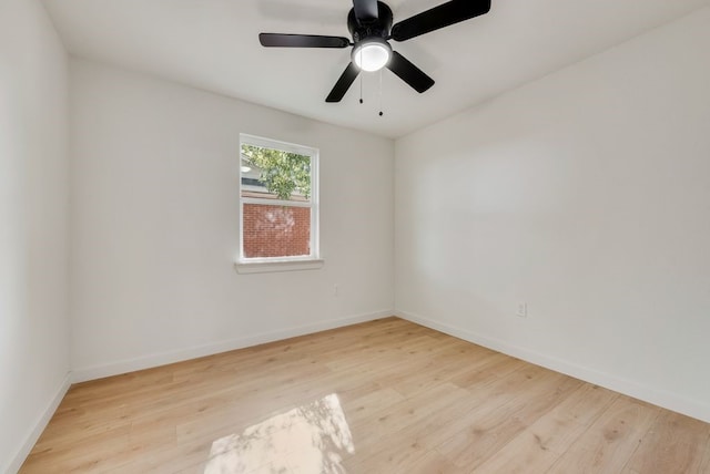 unfurnished room with ceiling fan and light hardwood / wood-style flooring