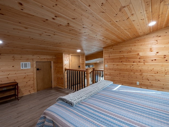 bedroom featuring wood-type flooring, lofted ceiling, wooden ceiling, and wood walls