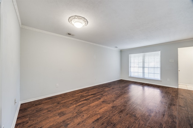 unfurnished room with wood-type flooring, a textured ceiling, and crown molding