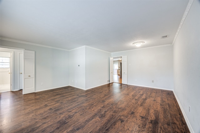 unfurnished room with dark hardwood / wood-style flooring and ornamental molding