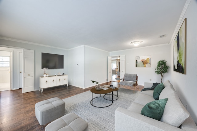 living room with ornamental molding and dark wood-type flooring