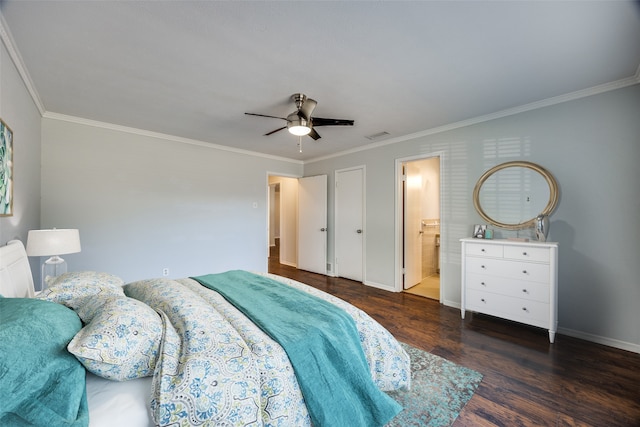 bedroom featuring ceiling fan, dark hardwood / wood-style flooring, crown molding, and connected bathroom