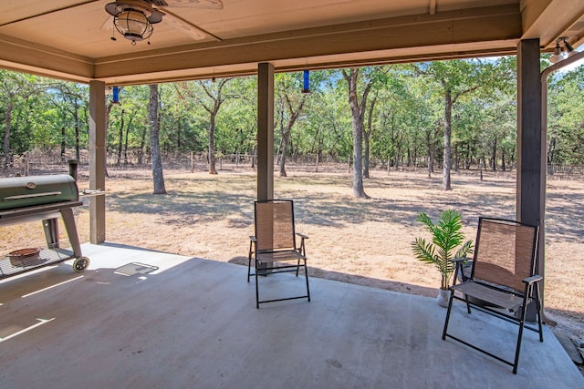 view of patio / terrace featuring ceiling fan and a grill