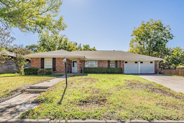 ranch-style home with a garage and a front yard