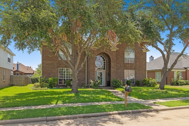 view of front facade with a front lawn