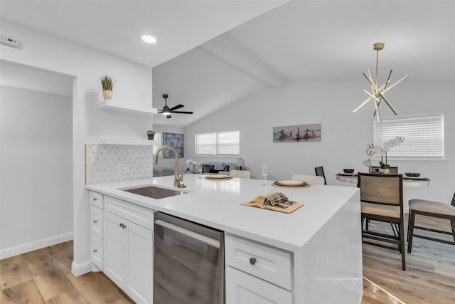 kitchen featuring stainless steel dishwasher, ceiling fan, sink, light hardwood / wood-style flooring, and white cabinets