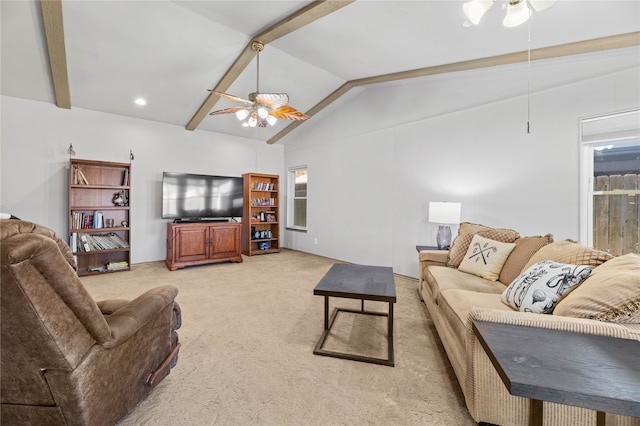 living room with light carpet, lofted ceiling with beams, and ceiling fan