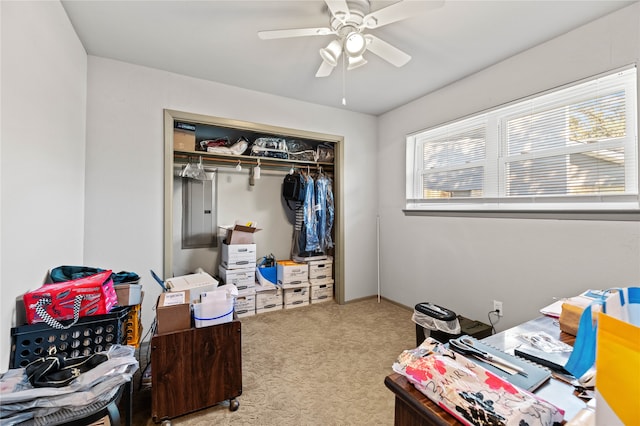 bedroom featuring a closet, ceiling fan, and light colored carpet