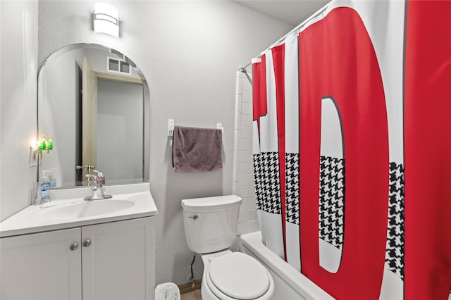 full bathroom featuring vanity, toilet, and shower / bathtub combination with curtain