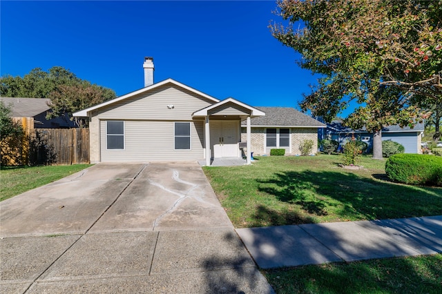 single story home with a front lawn