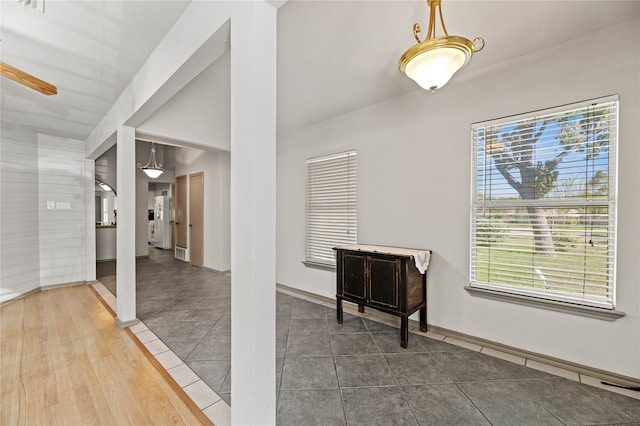 hall with wood-type flooring