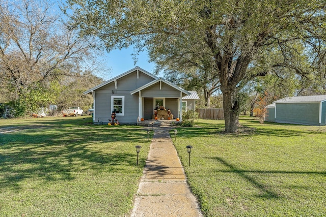 view of front of home featuring a front lawn and a porch