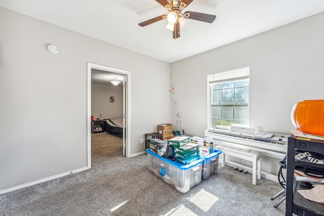 interior space with ceiling fan