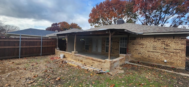 rear view of property featuring a patio