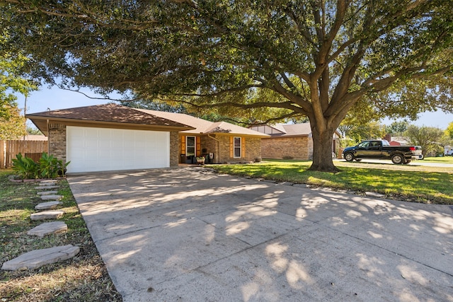 ranch-style house with a front lawn and a garage