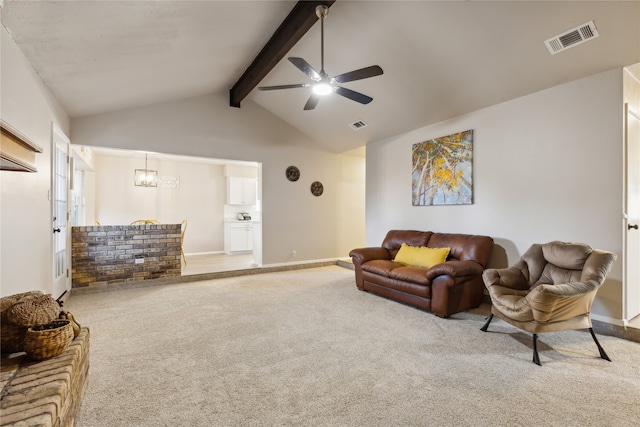 carpeted living room featuring ceiling fan with notable chandelier, beam ceiling, and high vaulted ceiling