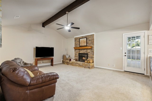 carpeted living room with vaulted ceiling with beams, ceiling fan, and a fireplace