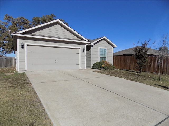 single story home featuring a garage