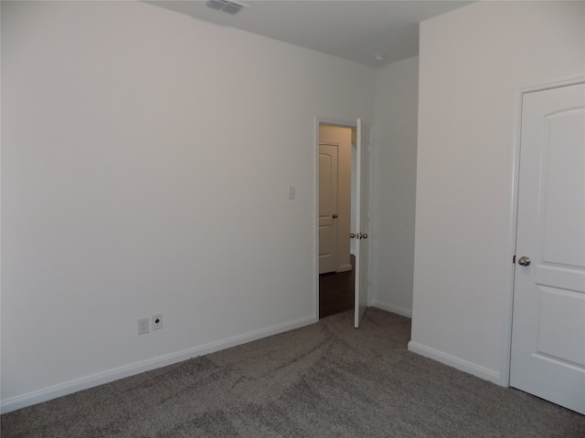 empty room with carpet floors