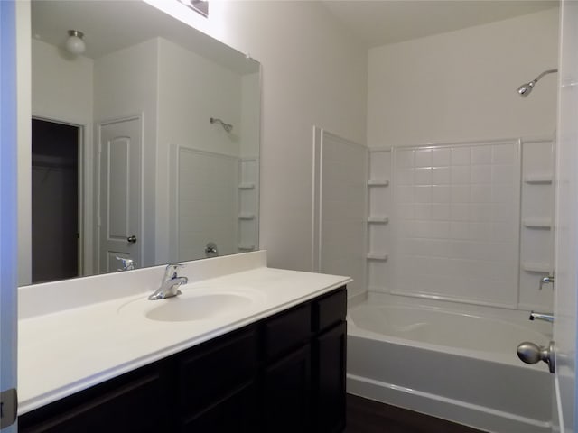 bathroom with vanity and tub / shower combination