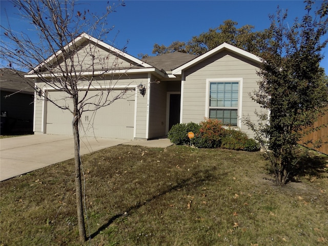 single story home featuring a front yard and a garage