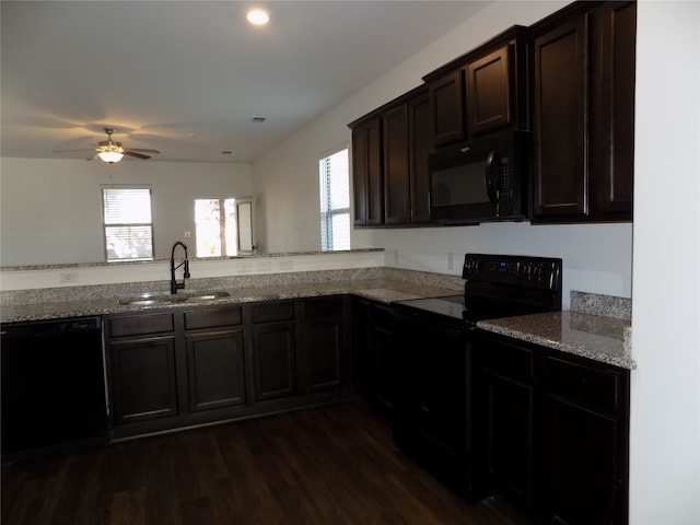 kitchen with black appliances, ceiling fan, sink, and a wealth of natural light