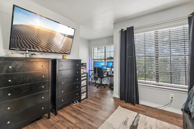 bedroom featuring dark hardwood / wood-style floors