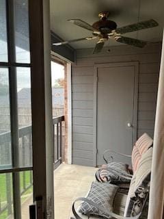 sunroom / solarium with ceiling fan