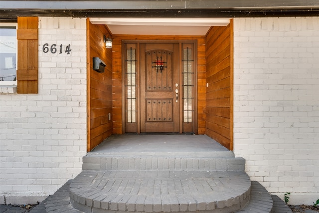 entrance to property with a porch